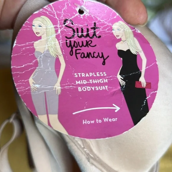 SPANX suit your fancy body suit.